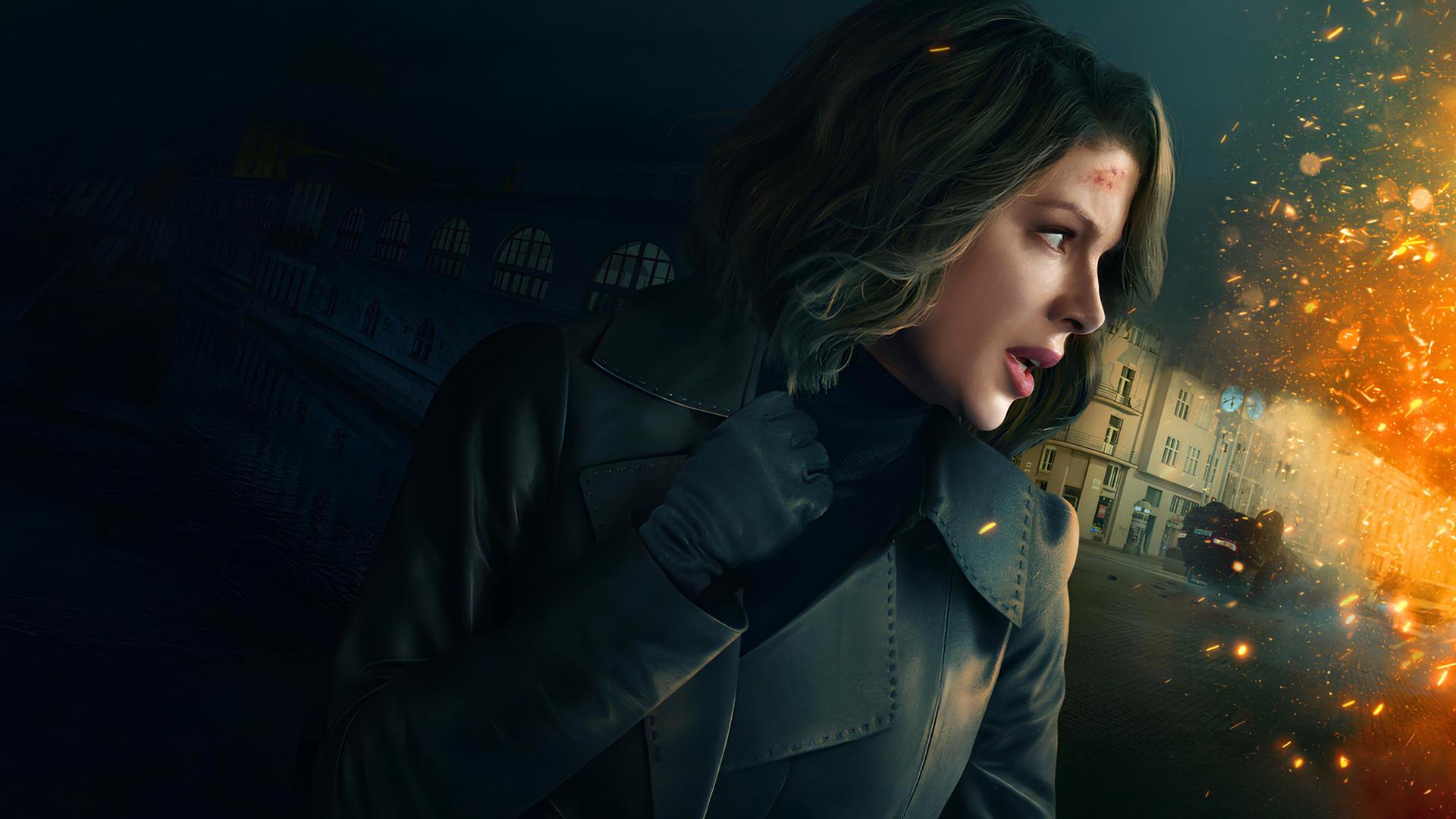Montage: Im Hintergrund steht eine Reihe mehrstöckiger Häuser in der Dunkelheit, an der Seite davor sprühen die hellen Funken eines explodierenden Autos; davor liegt die Porträtaufnahme von Avery Graves (Kate Beckinsale), die zur Seite schaut und die an der Stirn verletzt ist. 