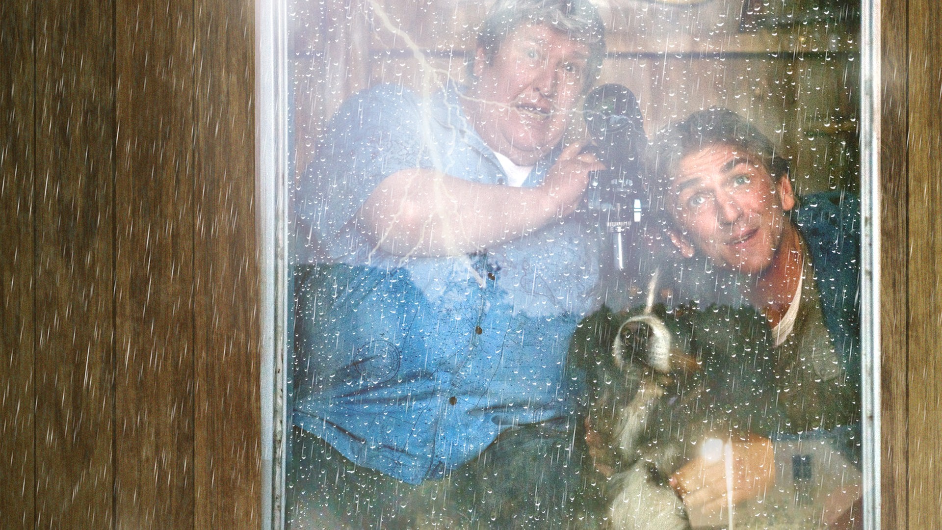 Fritz, Herr Paschulke und Keks schauen aus einem Fenster - draußen tobt ein Gewitter