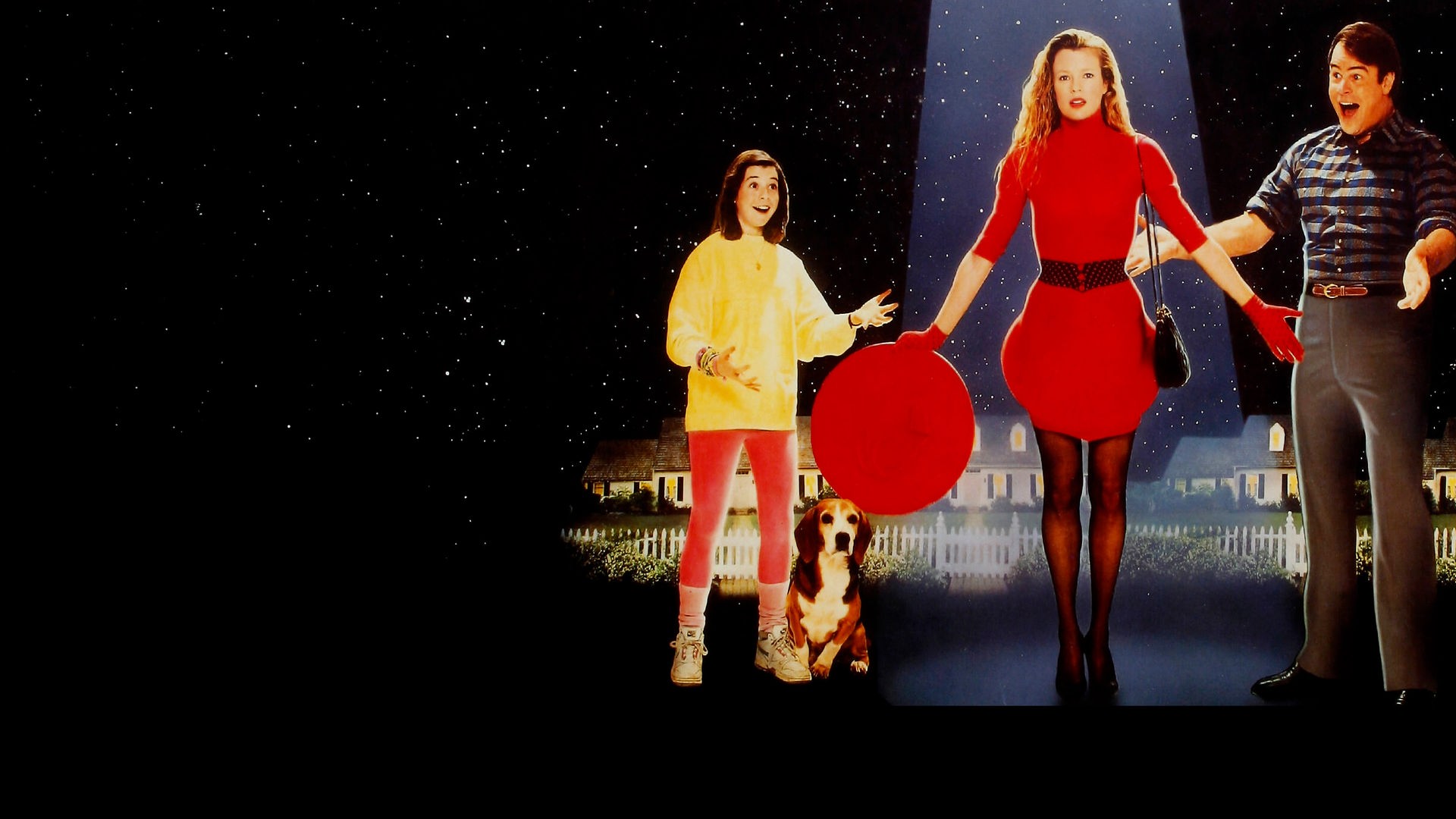 Auf dem Bild ist das Plakatmotiv des Films "Meine Stiefmutter ist ein Alien" zu sehen. Von links nach rechts stehen Jessie Mills (Alyson Hannigan), Celeste (Kim Basinger) und Ron Mills (John Lovitz) nebeneinander. Jessie und Ron sind jeweils zu Celeste in dre Mitte gewandt, die mit rotem Kleid in einem Lichtkegel steht. Im Hintergrund sind Reihenhäuser bei Nacht und der Sternenhimmel zu sehen.