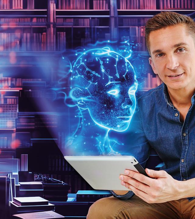 Eric mit Laptop in einer virtuellen Bibliothek