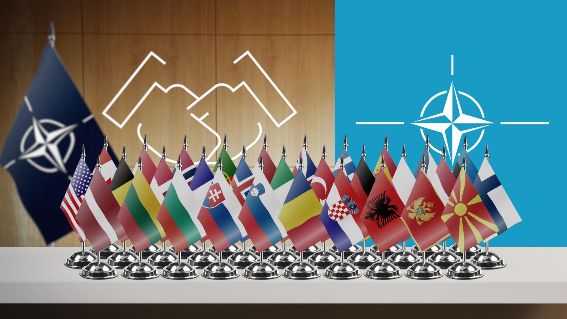 Nato-Symbol und Flaggen der Mitgliedsstaaten