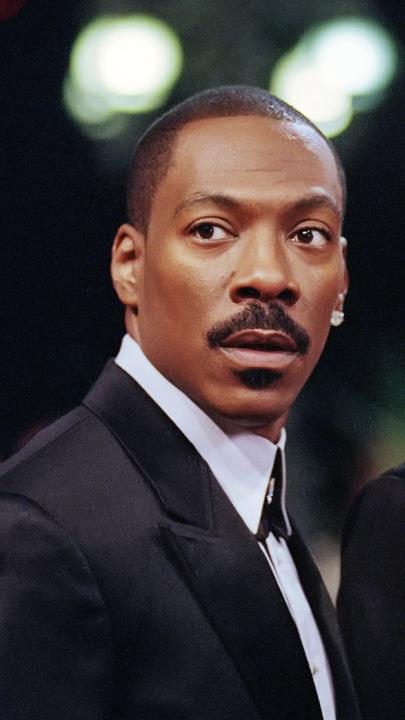 "I Spy": Kelly (Eddie Murphy) und Alex (Owen Wilson) in Großaufnahme nebeneinander.