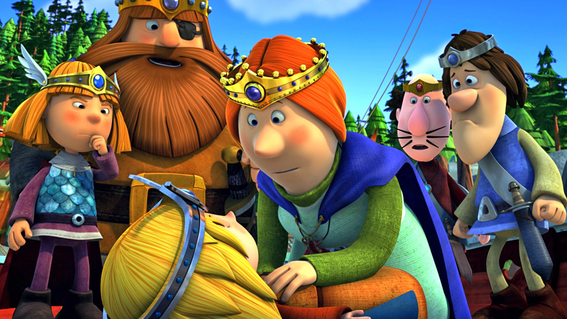 Die Wikinger spielen Theater. Im Vordergrund liegt Ylvi verkleidet als Gott der Freude auf dem Boden, Ylva beugt sich als Frigg über sie. Dahinter stehen die Wikinger. Wickie spielt Thor, den Gott des Donners. Rechts neben ihm steht Halvar als Odin. Gorm und Ulm sind ebenfalls verkleidet.