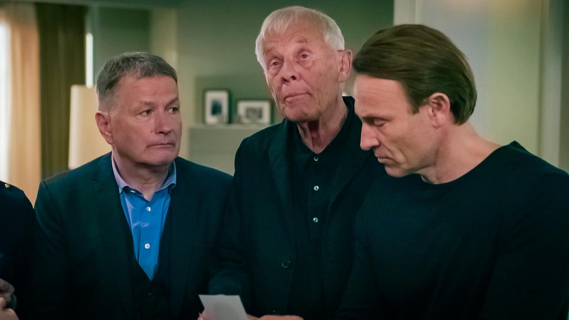 Drei Männer in Schwarz