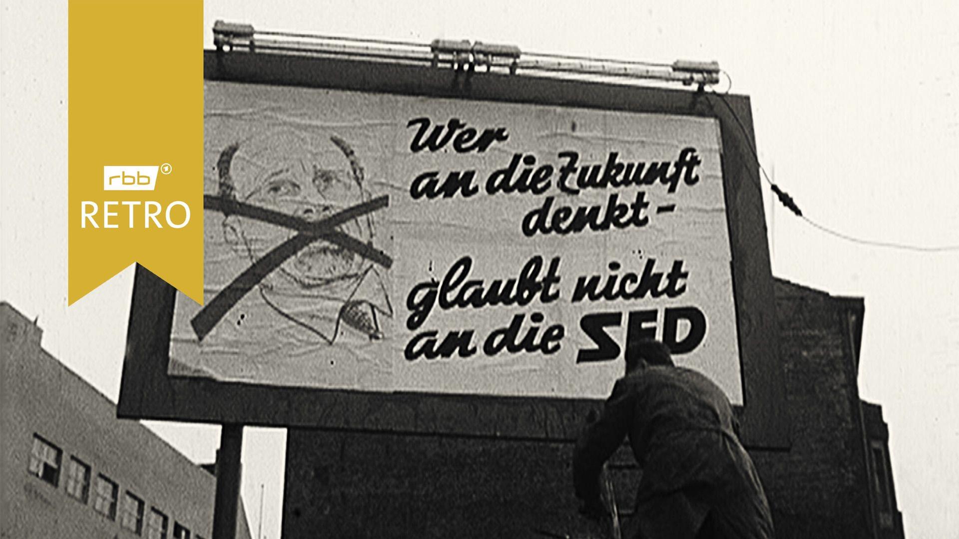 Neue Plakate an der Sektorengrenze