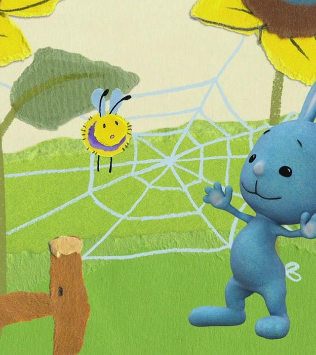 Ein Bienchen verfängt sich im Spinnennetz
