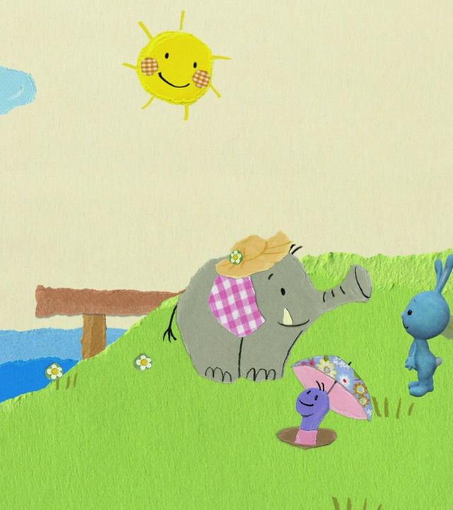 Ein Elefant hilft beim Gießen