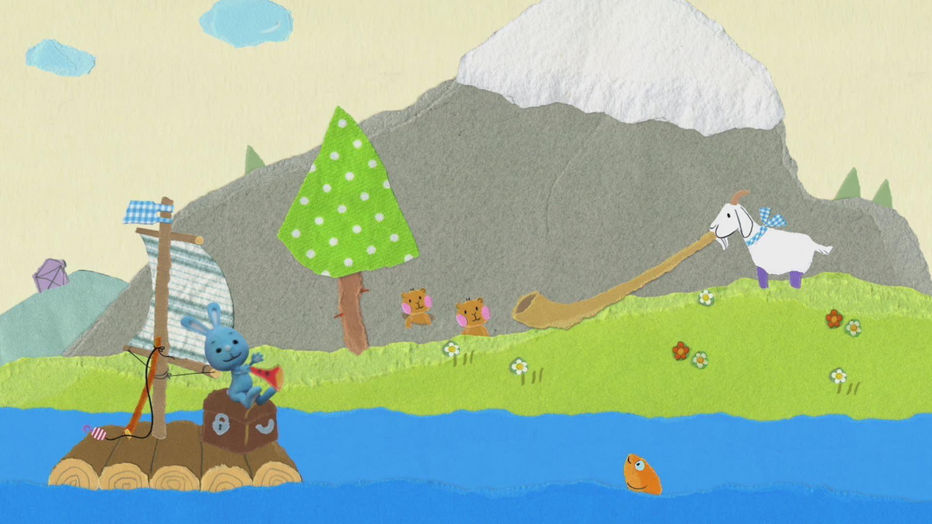 Eine Ziege spielt Alphorn