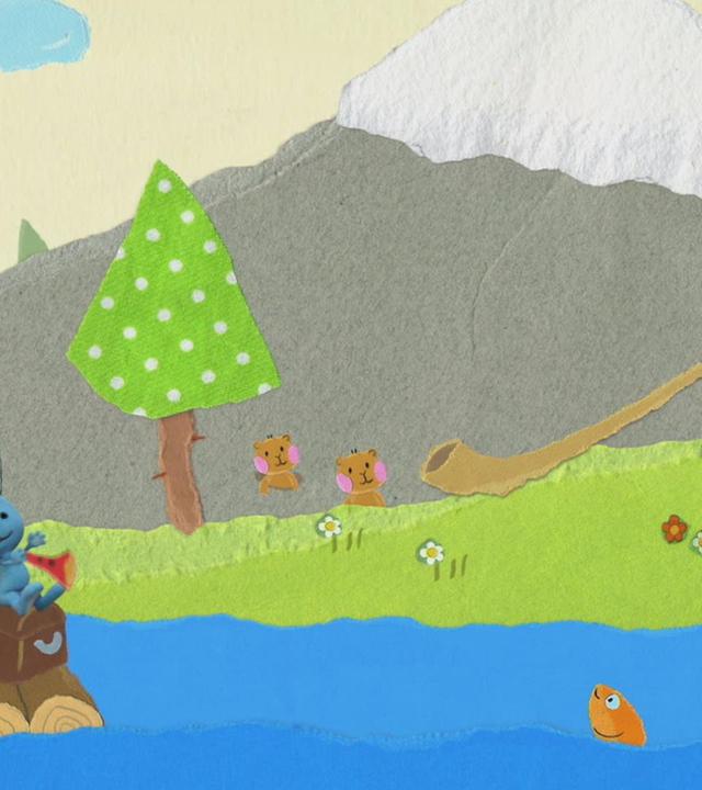 Eine Ziege spielt Alphorn