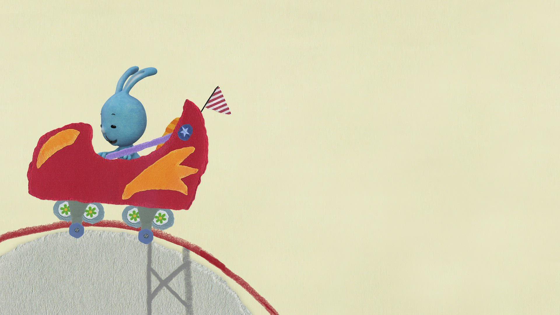 Kikaninchen fährt auf dem Rummel Achterbahn