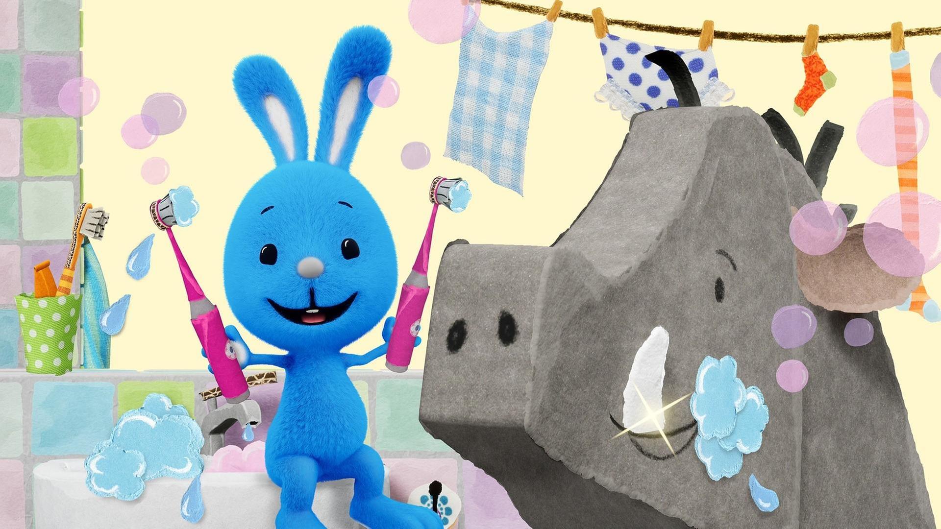 Kikaninchen putzt dem Wildschwein die Zähne