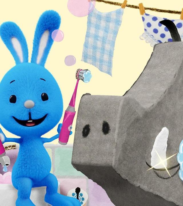 Kikaninchen putzt dem Wildschwein die Zähne