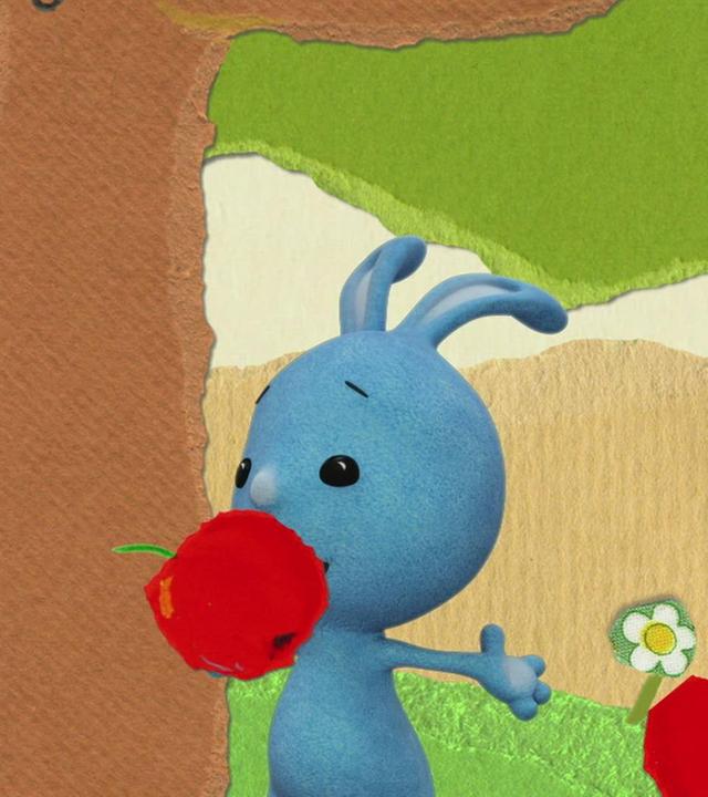 Kikaninchen schaukelt am Apfelbaum