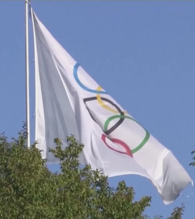 Die olympische Flagge.