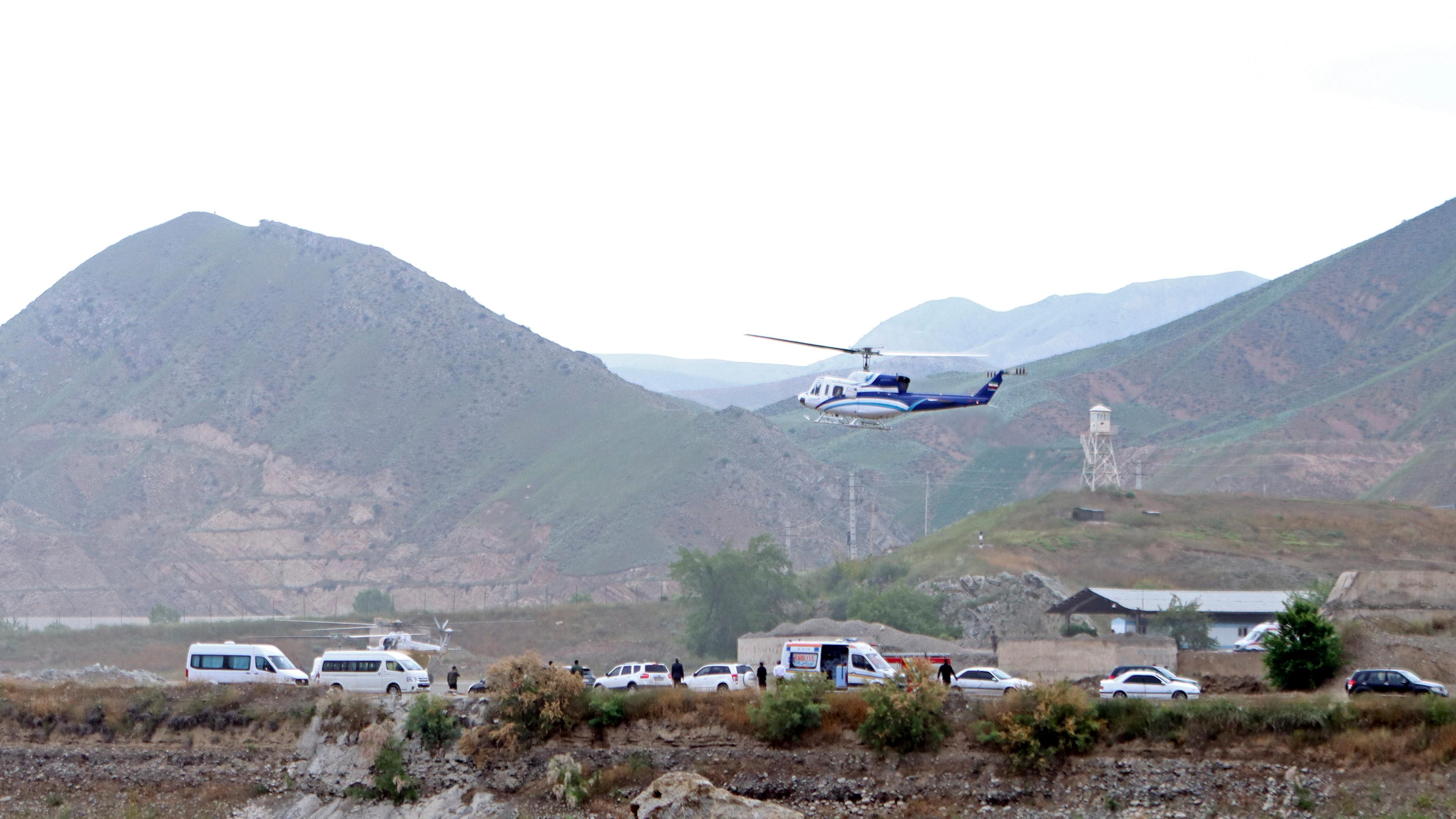 In this photo provided by Islamic Republic News Agency, IRNA, the helicopter carrying Iranian President Ebrahim Raisi takes off at the Iranian border with Azerbaijan after President Raisi and his Azeri counterpart Ilham Aliyev inaugurated dam of Qiz Qalasi, or Castel of Girl in Azeri, Iran, Sunday, May 19, 2024.