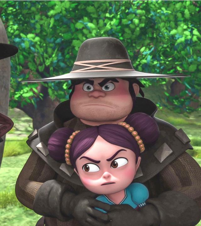 Isabelle wird von einem Banditen festgehalten, der hinter ihr steht. Ein anderer Bandit steht links daneben.