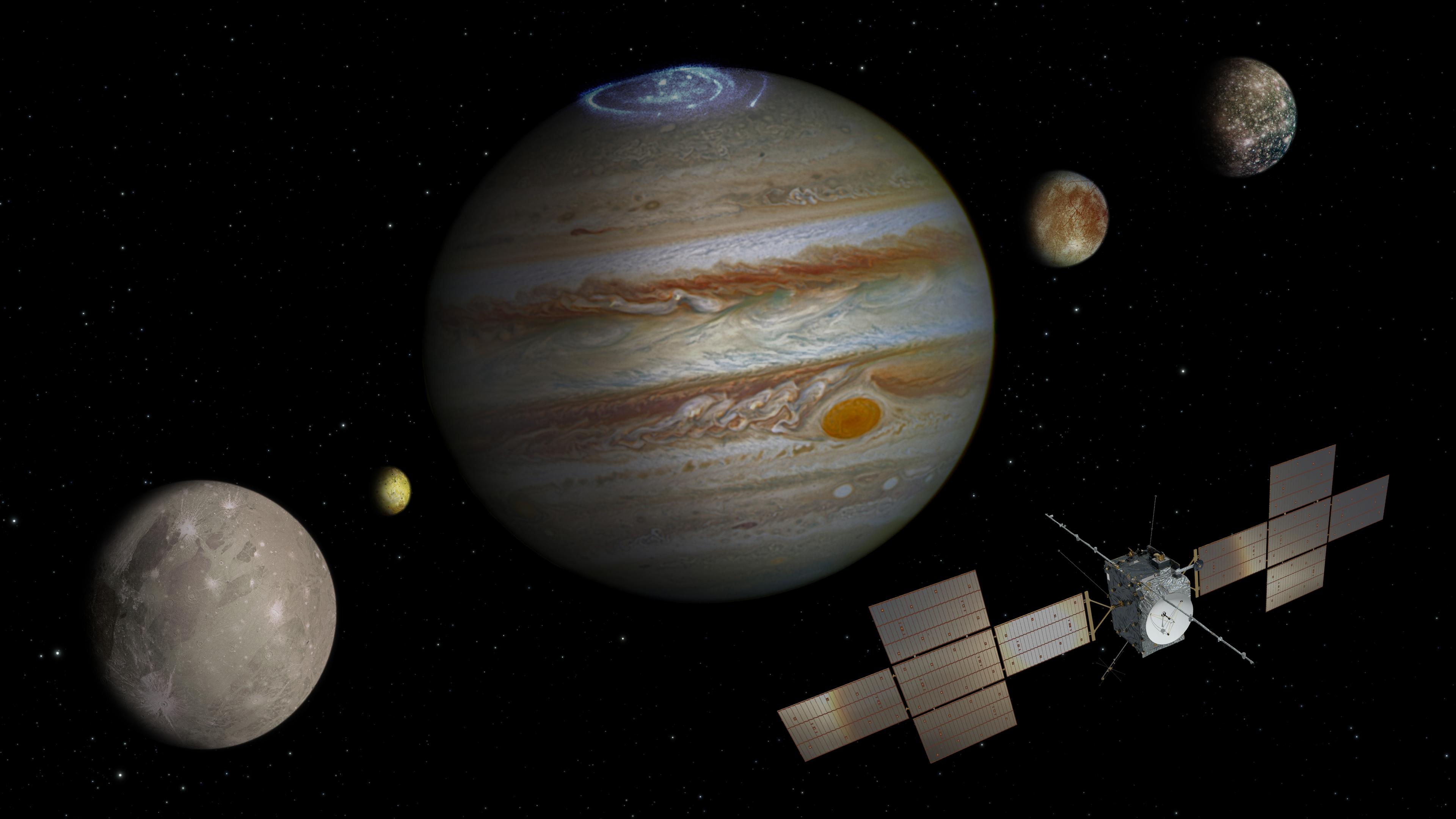 Die nicht maßstabsgetreue Abbildung zeigt die Sonde «Juice», Jupiter (M) und die Monde Ganymed (l-r), Io, Europa und Kallisto. Der Start der Sonde ist für den 13. April vom Weltraumbahnhof Kourou in Französisch Guayana geplant. (zu dpa «Die weiteste Reise der Esa: Sonde «Juice» soll zum Jupiter»)