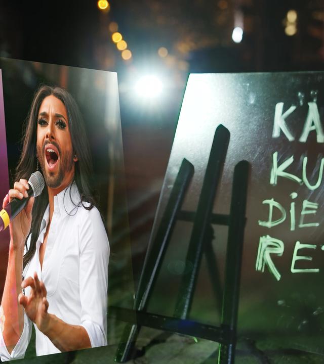 Links im Bild sind eine ältere Frau und ein Mann mit langen Haaren und Bart zu sehen, die in ein Mikrofon singen. Rechts steht eine Staffelage auf einer dunklen Straße, auf der geschrieben steht: Kann Kunst die Welt retten?