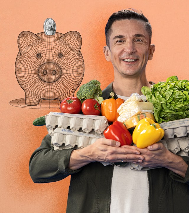 Erik Meyer hält Obst und Gemüse in der Hand 