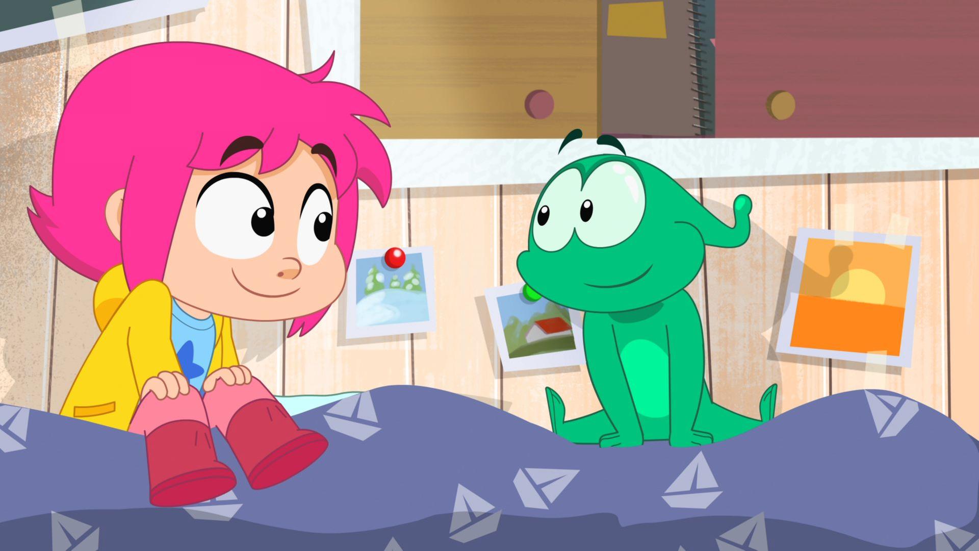 Das Mädchen Rebecca und die Supermikrobe Ernest sitzen sich auf Rebeccas Bett gegenüber und schauen sich lächelnd an.