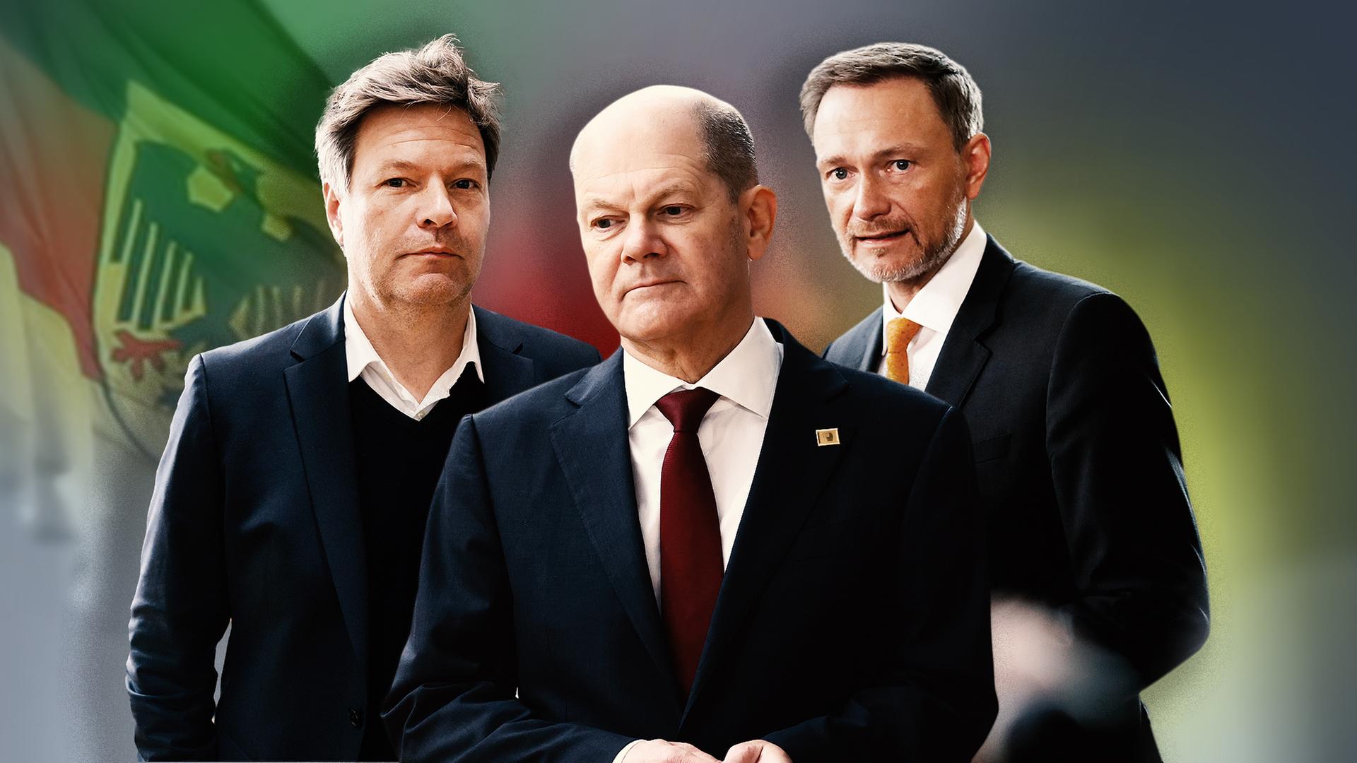 Robert Habeck (l), Olaf Scholz (m), Christian Lindner (r) vor verschwommenem Hintergrund, deutsche Flagge links oben