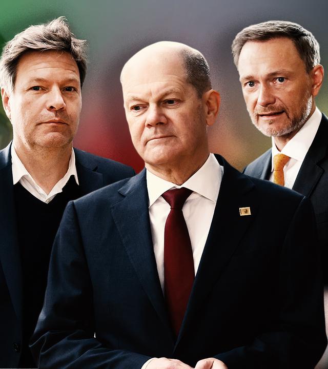 Robert Habeck (l), Olaf Scholz (m), Christian Lindner (r) vor verschwommenem Hintergrund, deutsche Flagge links oben