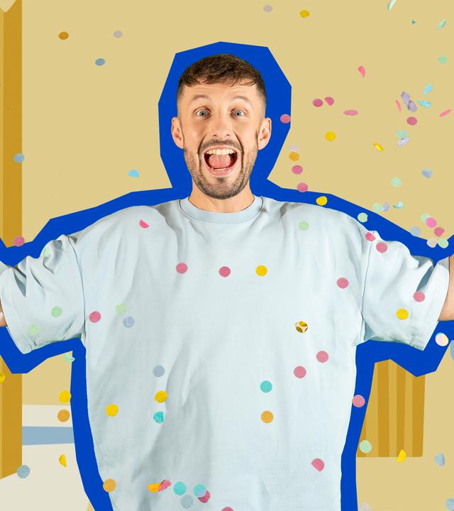 Der Sänger Nilsen steht mit weit ausgebreiteten Armen vor einem gemalten Badezimmer Hintergrund. Sein Mund ist weit aufgerissen und überall auf dem Bild ist Konfetti verteilt.