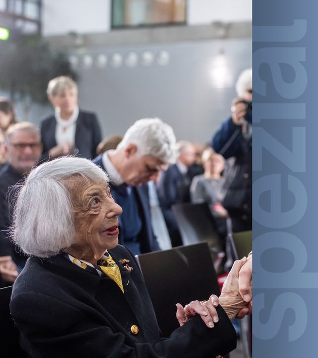 Bundeskanzler Olaf Scholz begrüßt die Holocaust-Überlebende Margot Friedländer bei der Feierstunde zum 80. Jahrestag der Befreiung von Auschwitz
