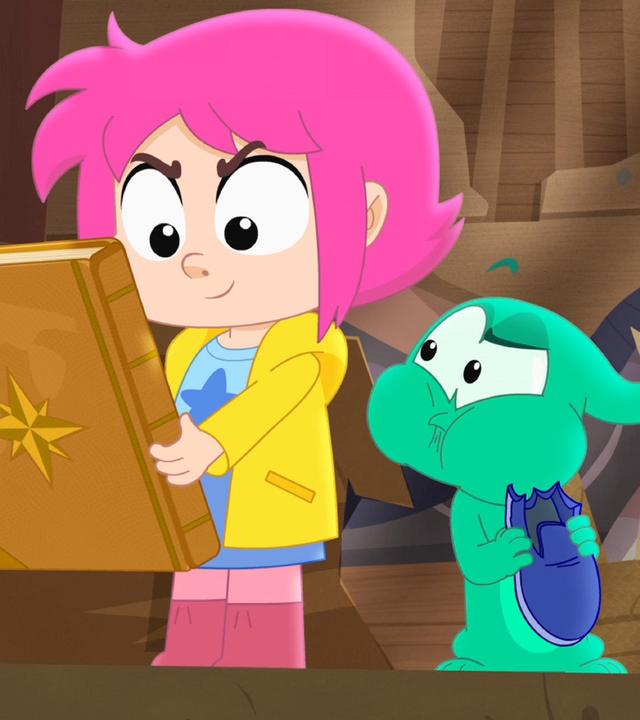 Rebecca und Ernest befinden sich auf dem Dachboden. Rebecca hält ein Buch in der Hand und schaut gespannt darauf, genau wie Ernest, der nebenbei noch einen Schuh isst.