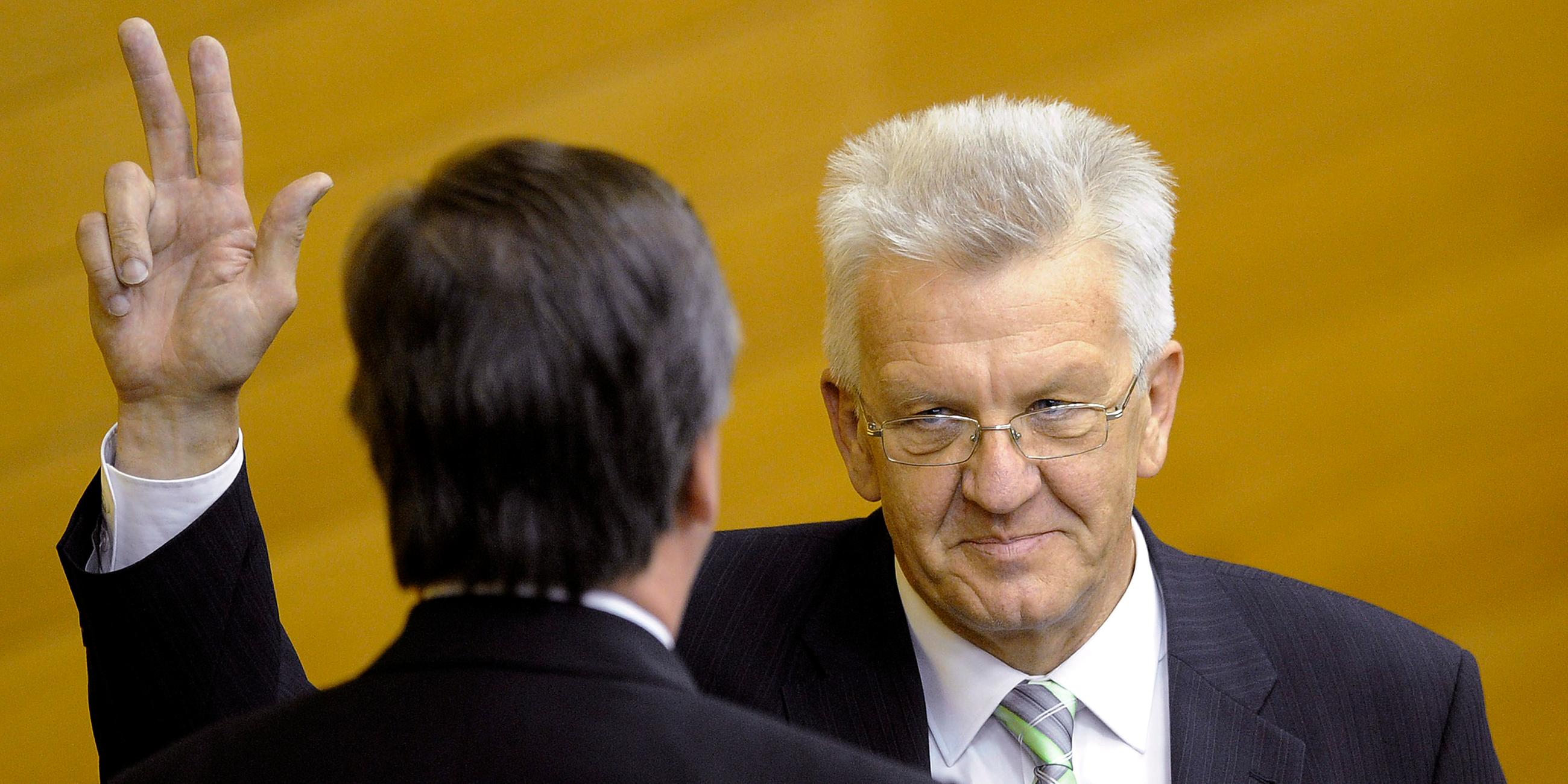 Winfried Kretschmann wird 2011 in Stuttgart als erster grüner Ministerpräsident vereidigt