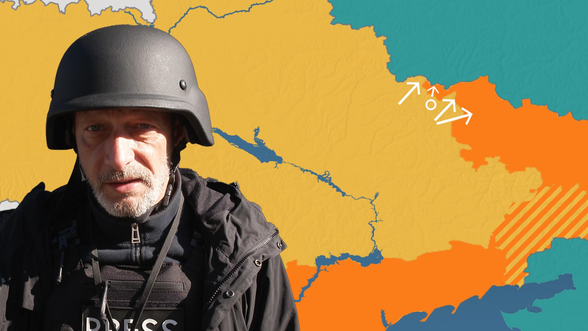 Eine Landkarte der Ostukraine und Grenze zu Russland. Reporter Arndt Ginzel im Vordergrund links unten.