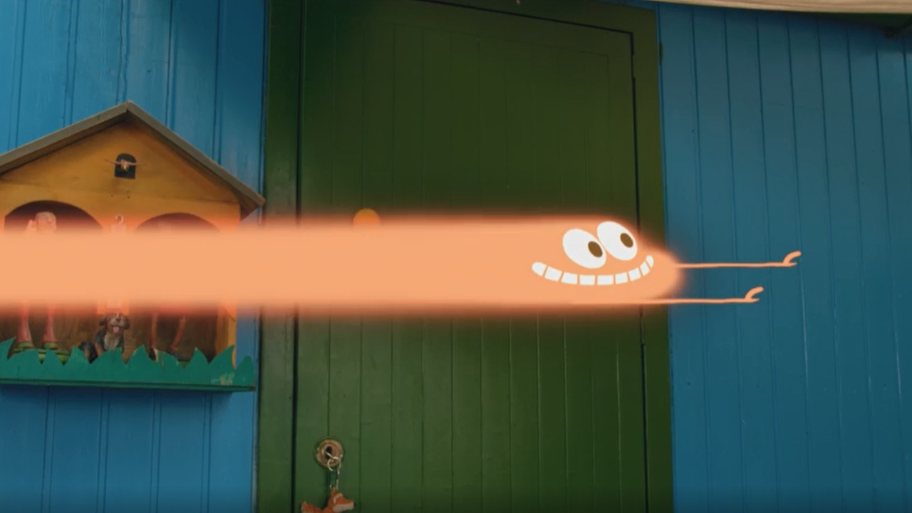 Ein lachender Comic-Laserstrahl vor dem Bauwagen