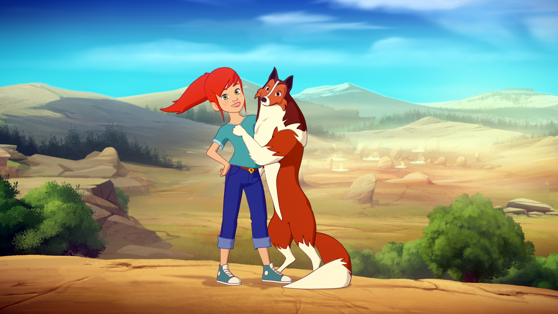 Zoé und Lassie posieren vor einer Wüstenlandschaft für ein Foto.