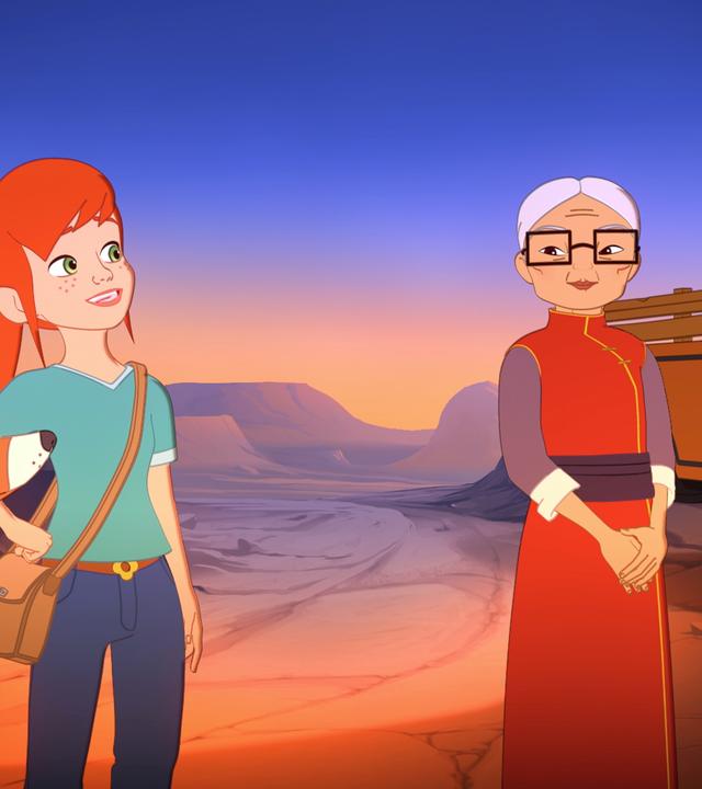 Lassie, Zoé, Mrs. Lee und Harvey stehen zufrieden lächelnd bei Sonnenuntergang in einer bergigen Landschaft.