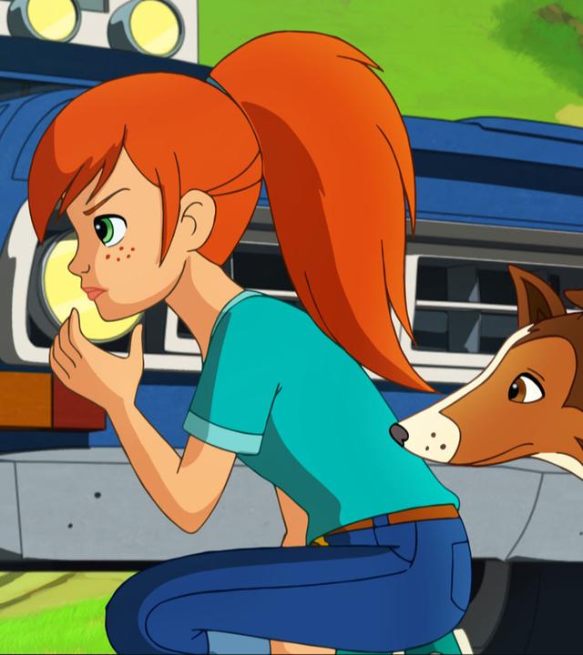 Lassie und Zoé verstecken sich hinter einem Auto und beobachten das Vorgehen.