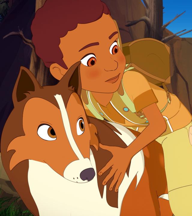 Zoé, Harvey und Lassie verstecken sich im Gebüsch. Harvey und Lassie schauen Zoé an, die den beiden mit einem Handzeichen signalisiert still zu sein.