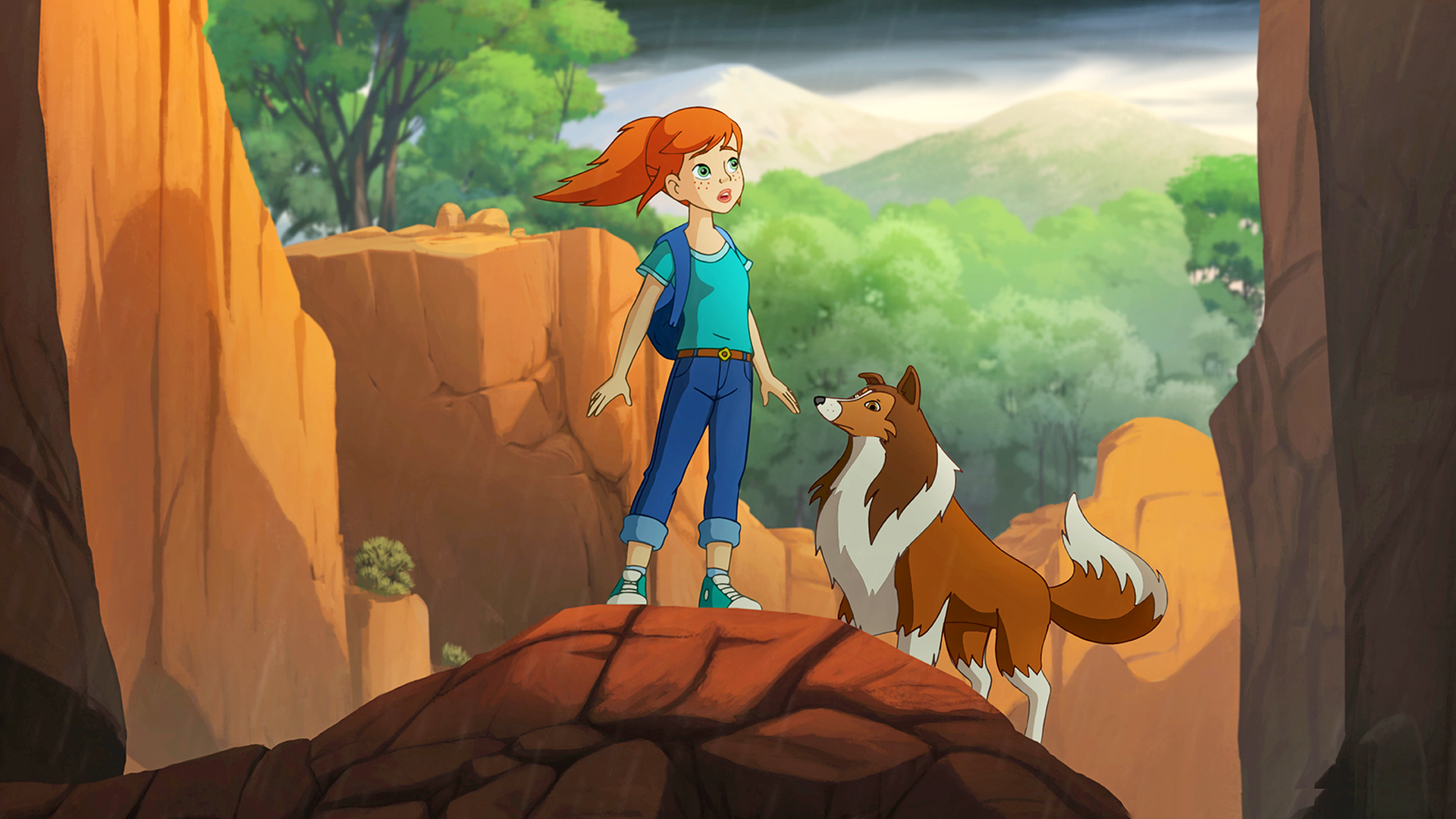 Lassie und Zoé stehen auf einem Felsvorsprung und halten Ausschau.