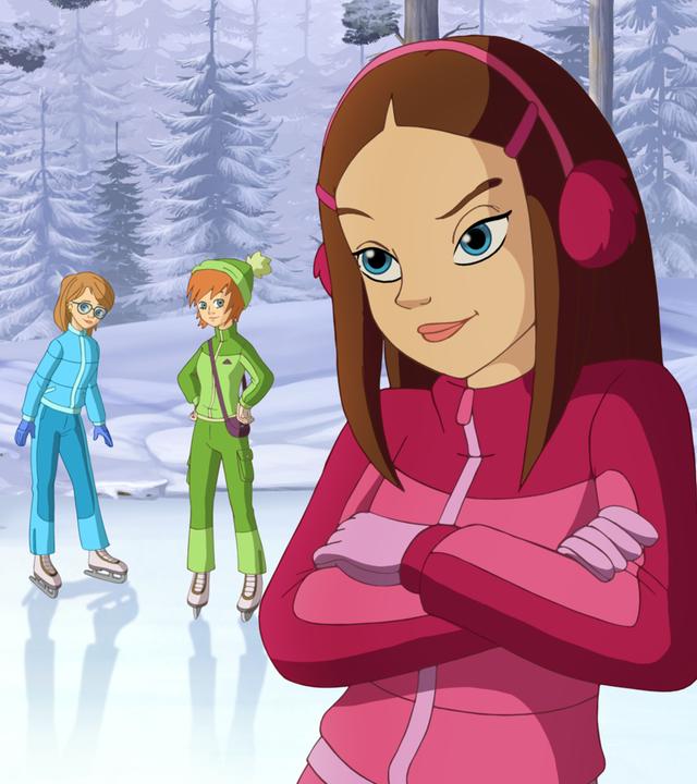 Samantha und die Mädchen stehen mit ihren Schlittschuhen auf dem gefrorenen Smaragdteich.