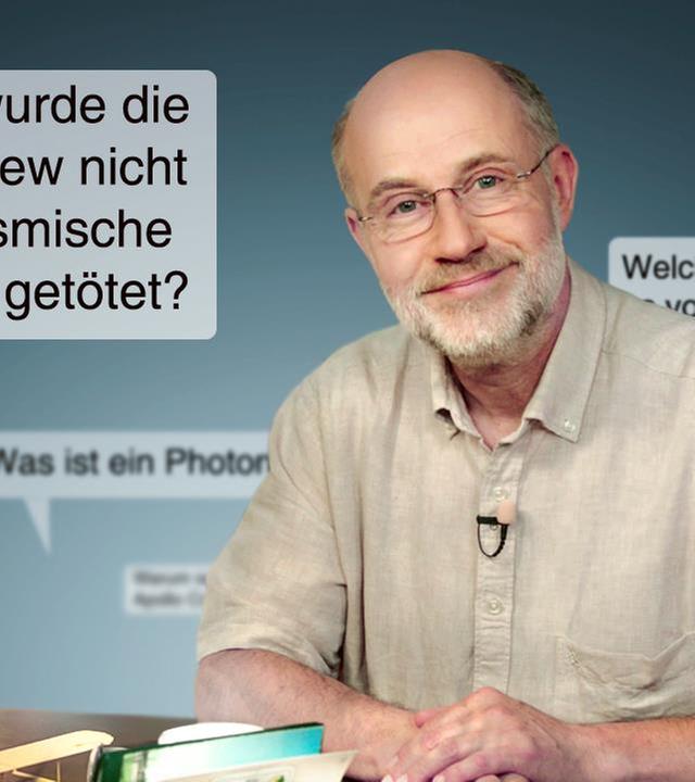 Professor Harald Lesch zwischen Sprechblasen