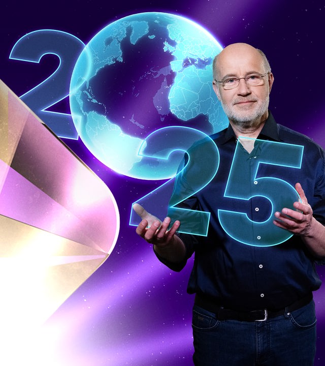 Harald Lesch hält die Jahreszahl 2025 in seinen Händen.