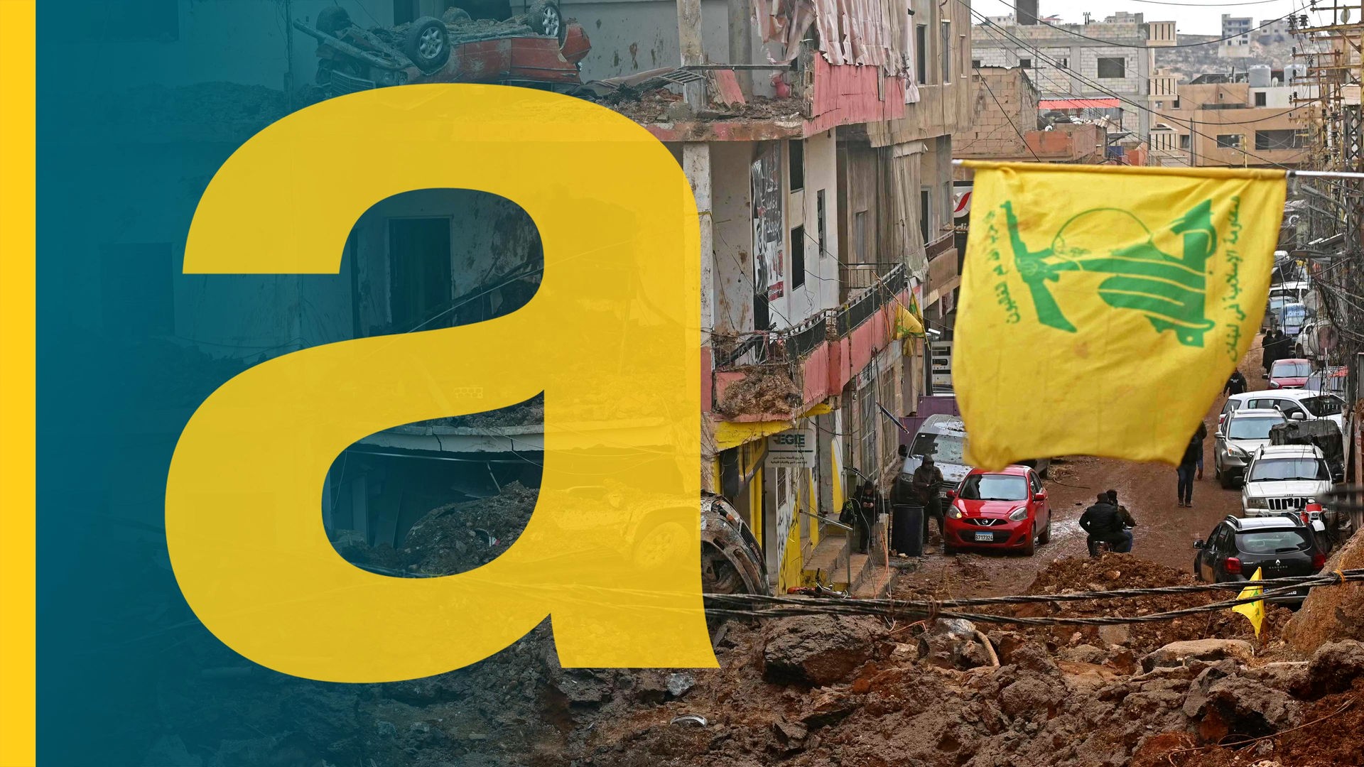 Wehende Hisbollah-Flagge vor den Trümmern im Libanon