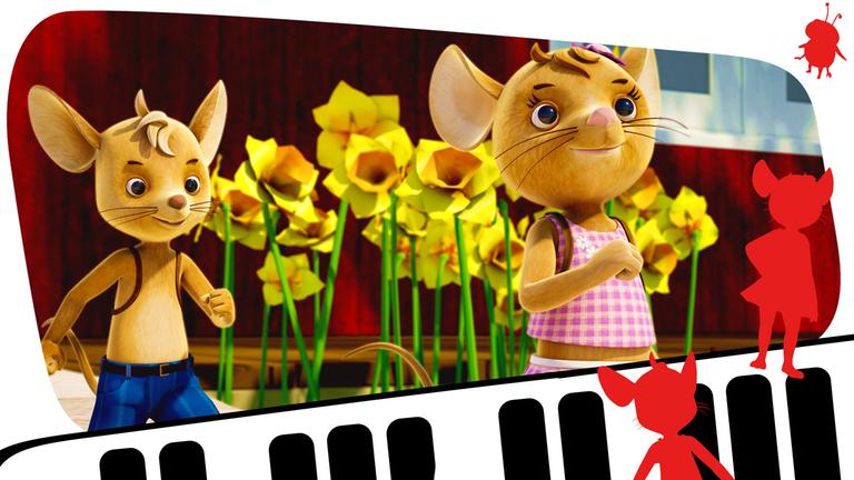 Jo und Naya brechen auf. Blumen stehen im Hintergrund.