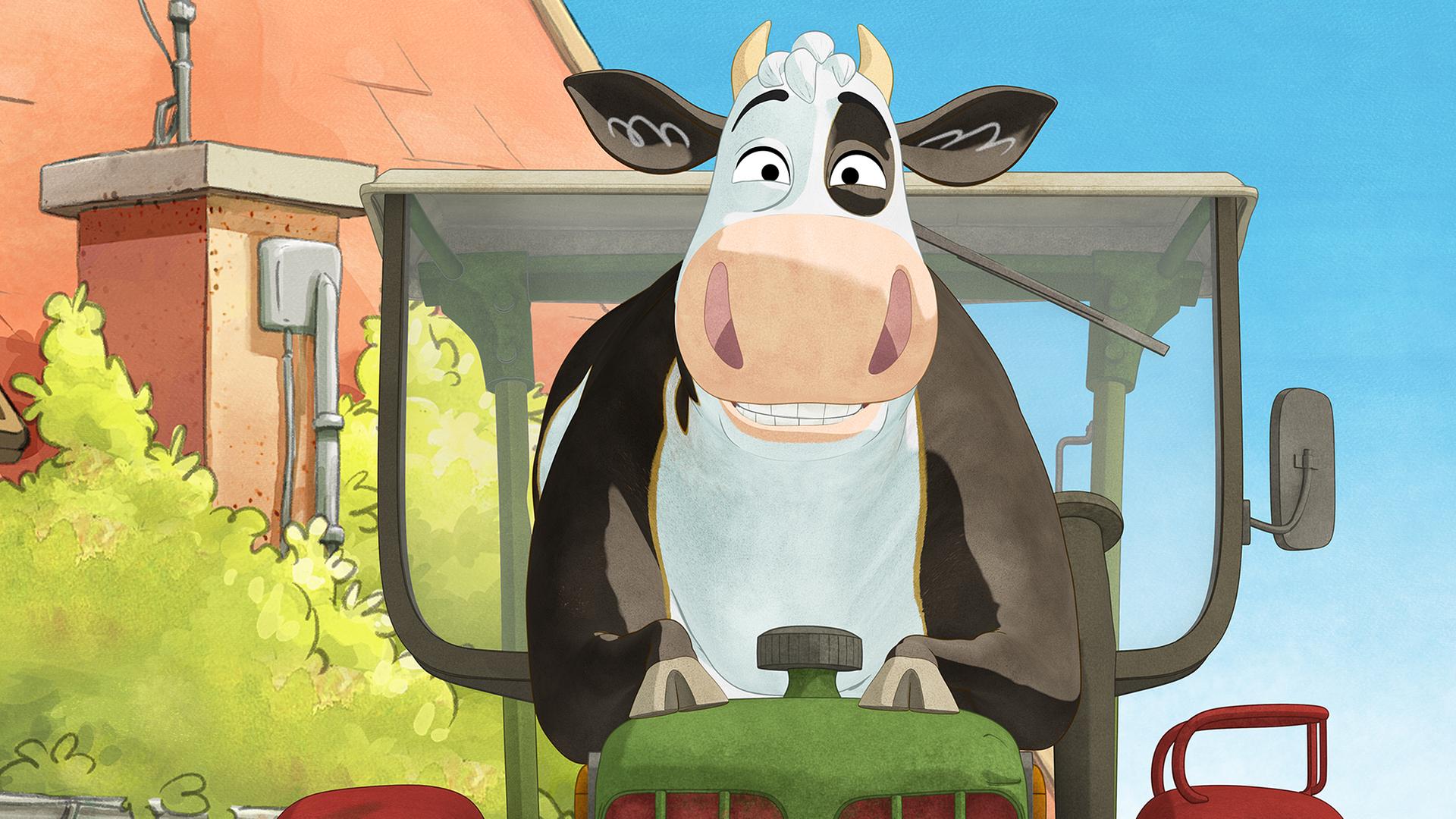 Lieselotte sitzt auf dem Traktor.