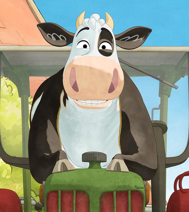 Lieselotte sitzt auf dem Traktor.