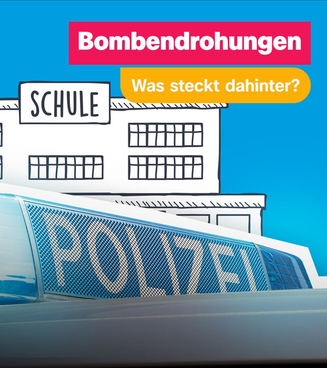 Eine Schule mit Polizei im Vordergrund