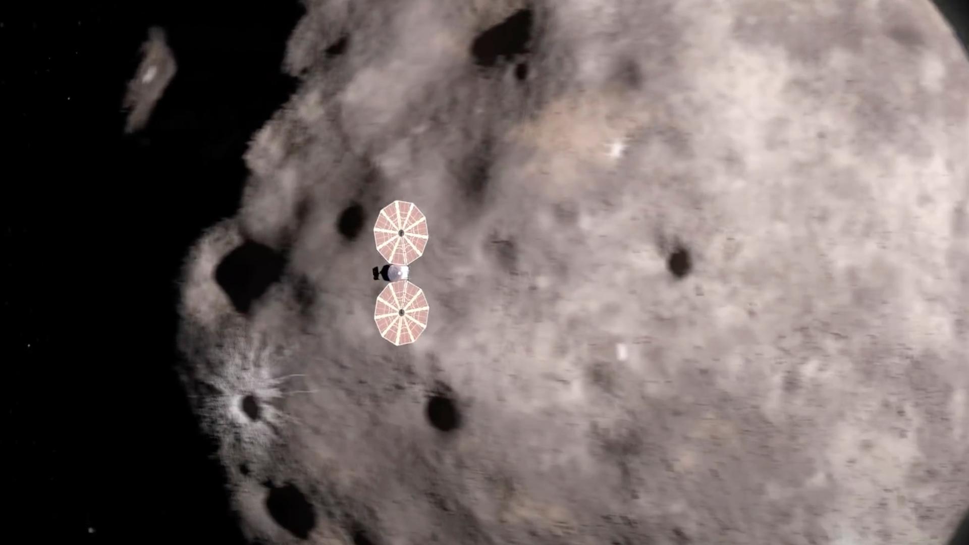 Videoanimation der Raumsonde "Lucy" bei Annäherung an einen Asteroiden.