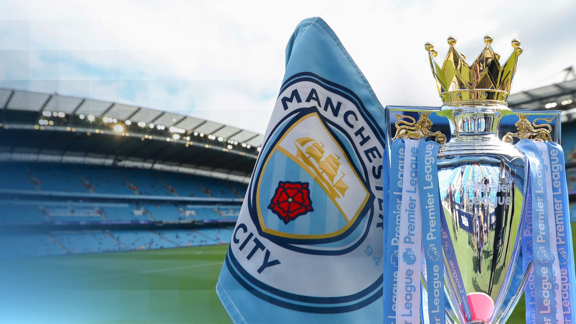 Die Eckfahne im Fußballstadion von Manchester City, welche das Logo zeigt. Daneben ist die Trophäe für das Gewinnen der Premier League abgebildet.