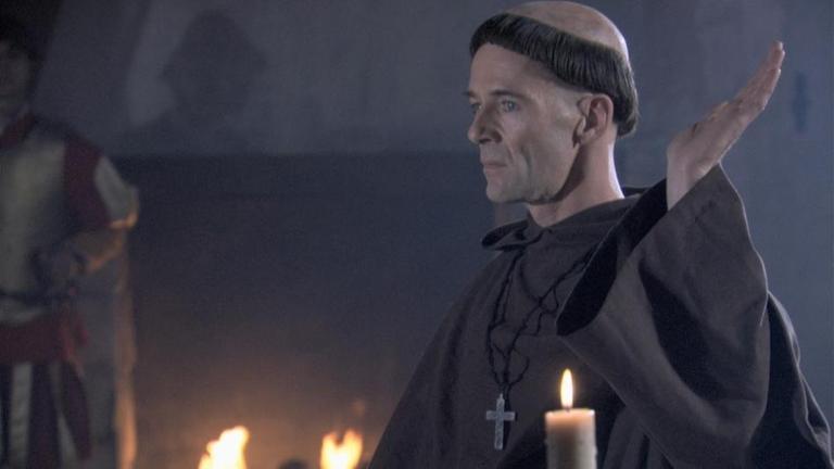 Martin Luther hebt die Hand vor dem Reichstag in Worms