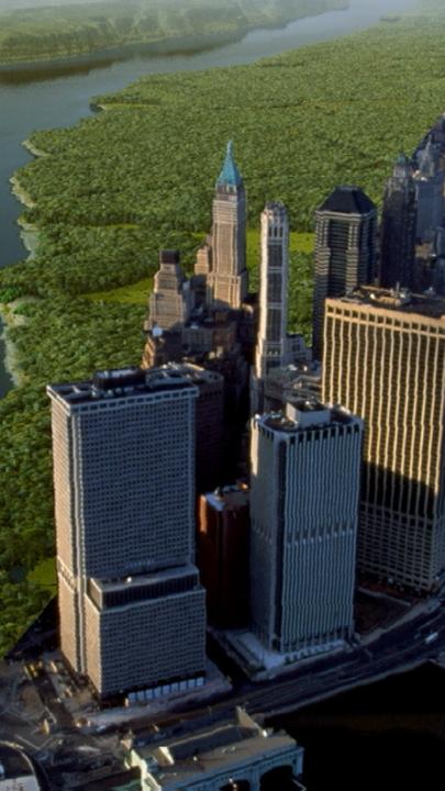 Metropolen in Gefahr: New York gegen die Flut": Luftbild auf New York mit Wolkenkratzern und angrenzendem Wasser.