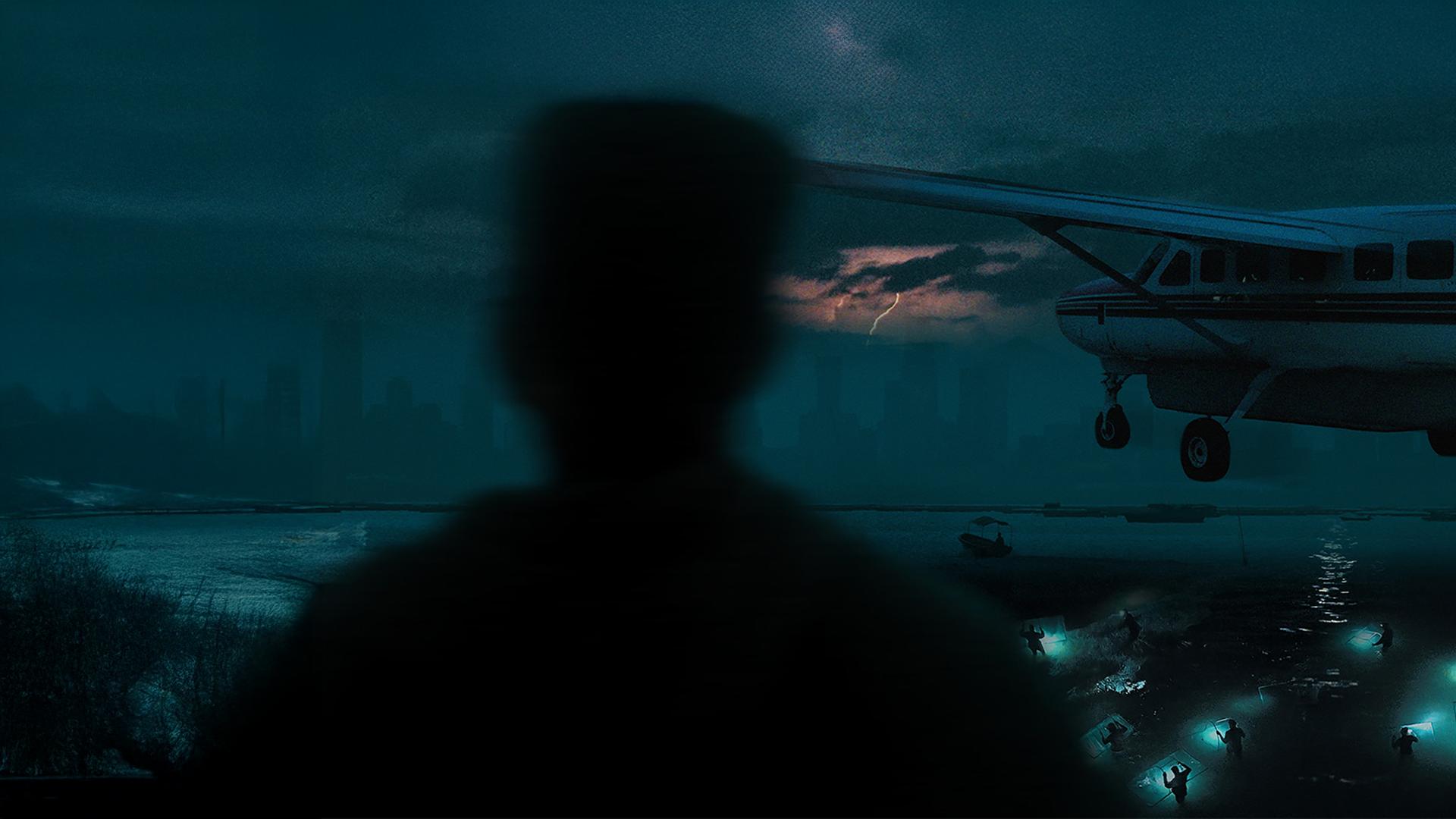 Taucher, ein Flugzeug und eine Silhouette im Dunkeln